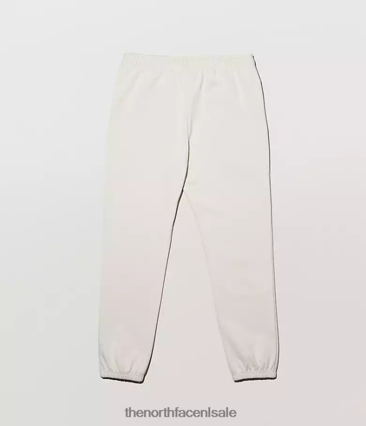 Heren Tnf x kaws joggingbroek The North Face P464ZN551 kleding maanlicht ivoor